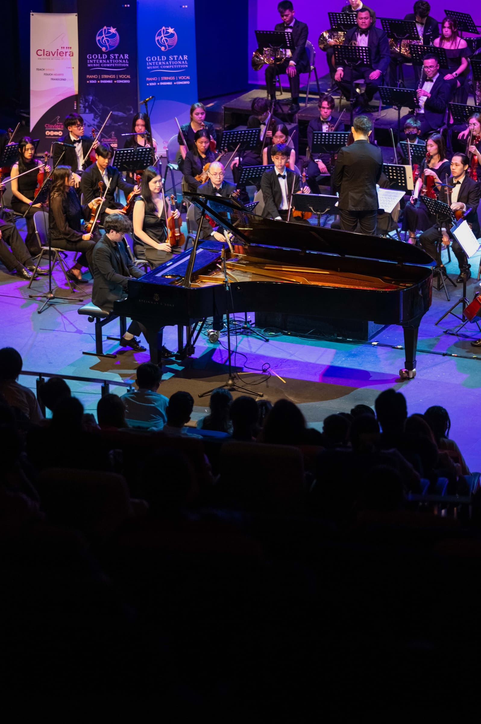 A pianist performs with the orchestra at the 2024 Gold Star International Music Competition