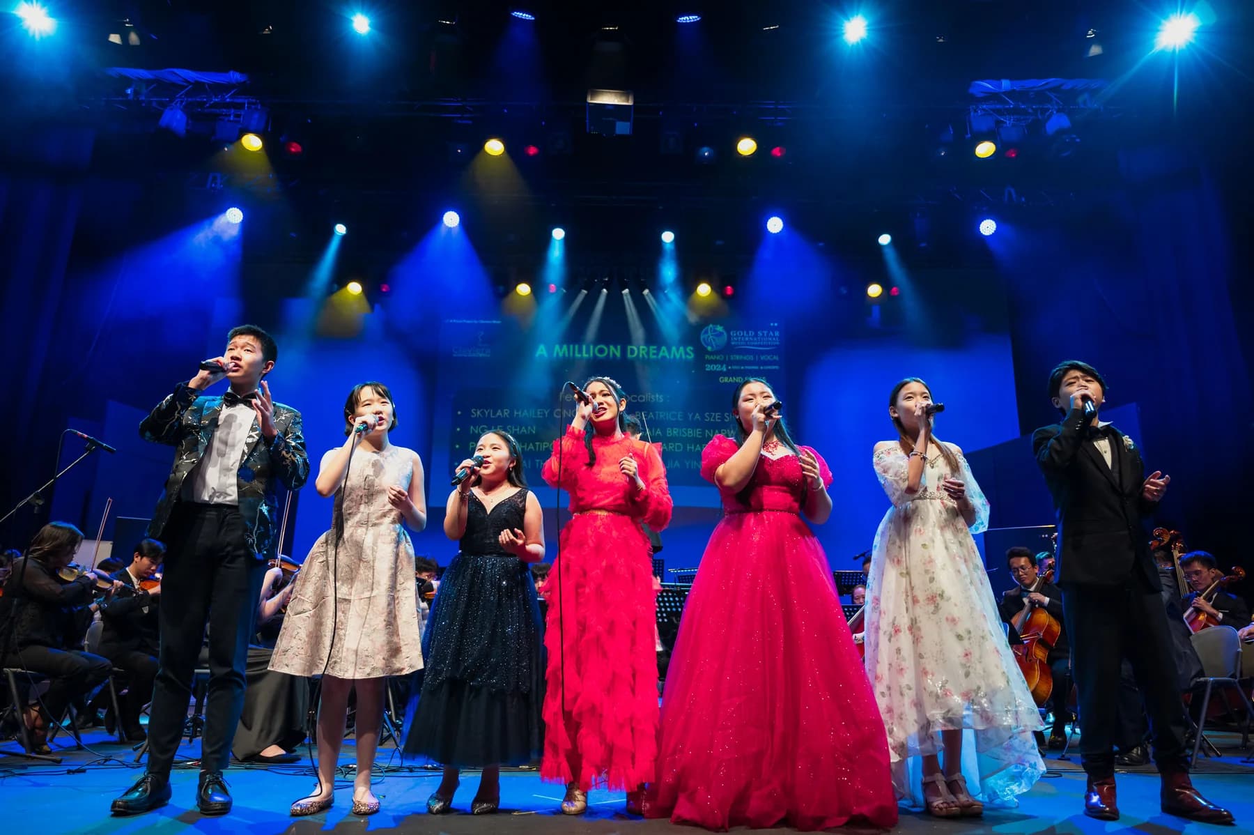 A vocal ensemble performs together on stage during the 2024 programme