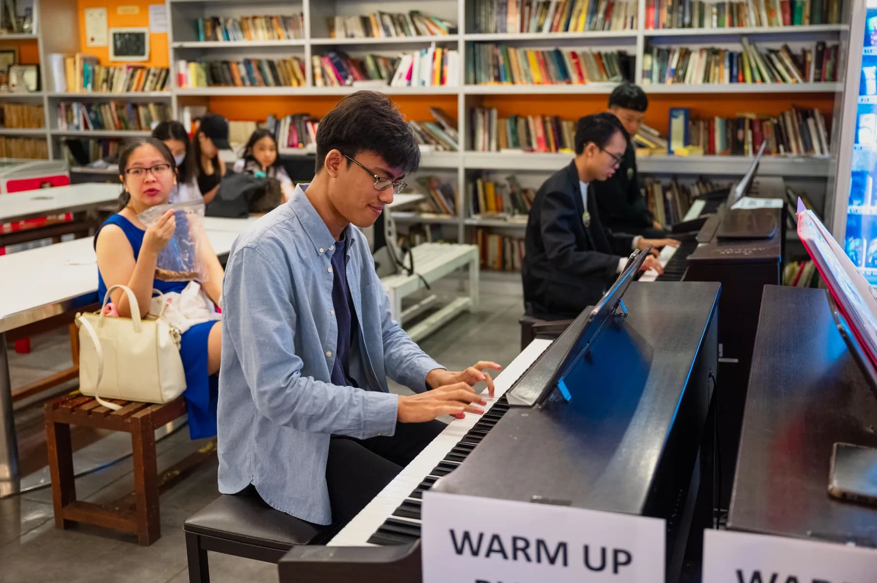 A pianist warms up before a 2024 Competition performance