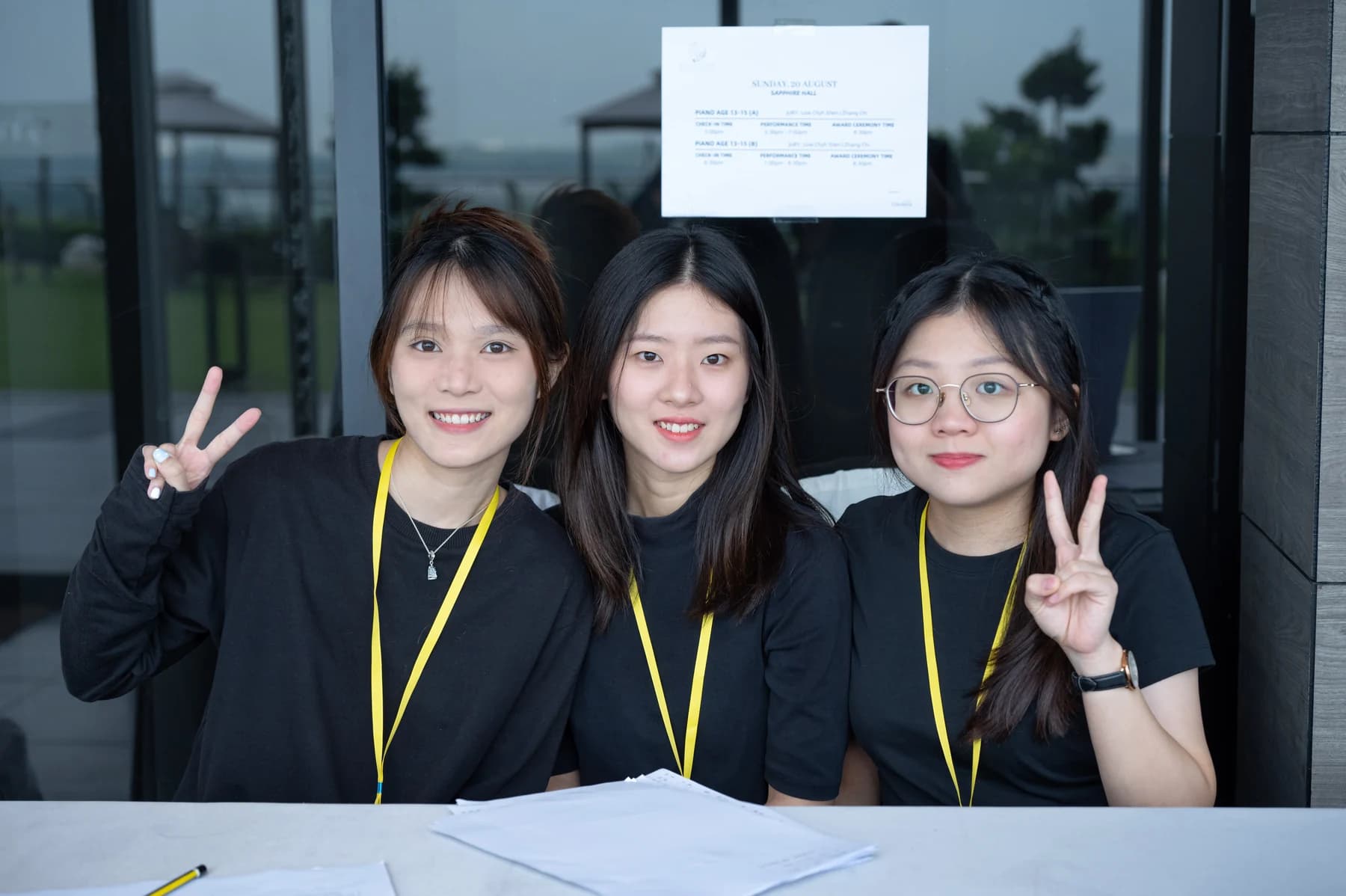 The welcome team smiles at the Gold Star Music Festival 2023 registration desk
